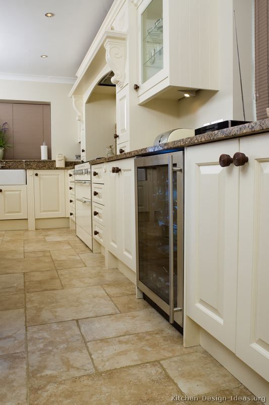 Kitchen white cabinets tile floor | Hawk Haven
