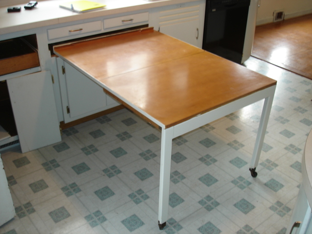 kitchen cabinet table pulls out table