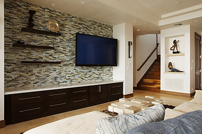 living room with tiles on wall