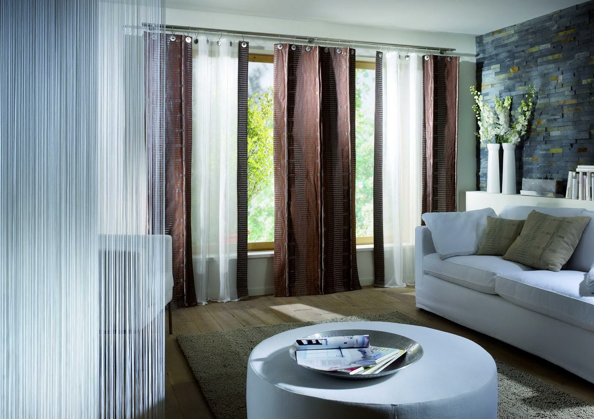 living room with metallic curtains