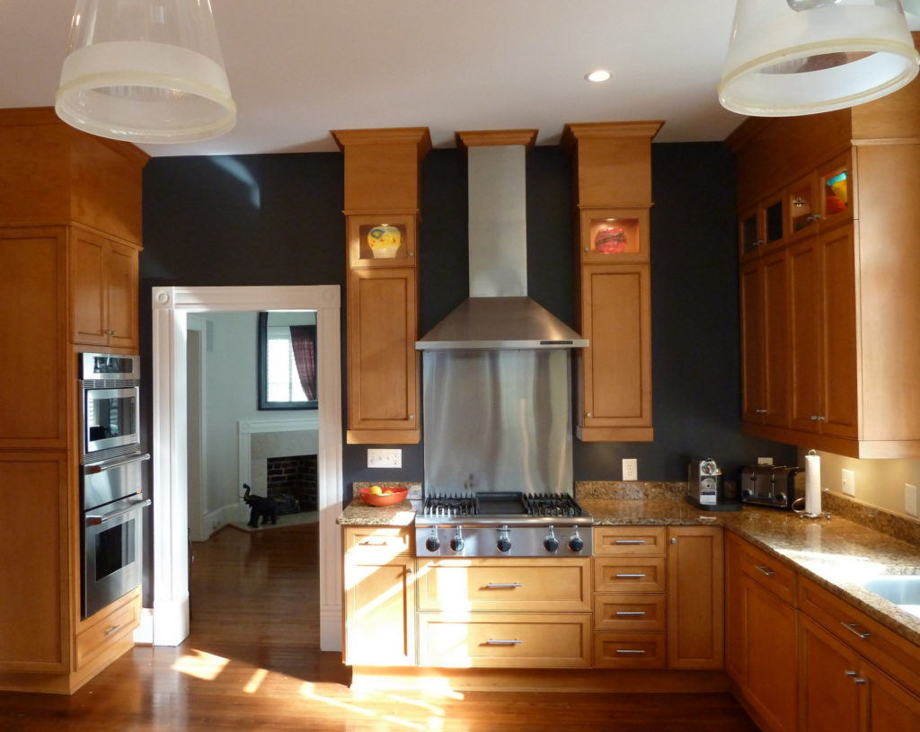 Black kitchen cabinets and wall color