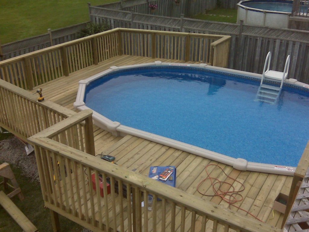 Swimming pool designs with decking