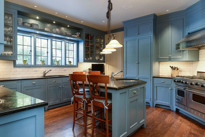 White Kitchen with Dark Blue Tiling photo - 2