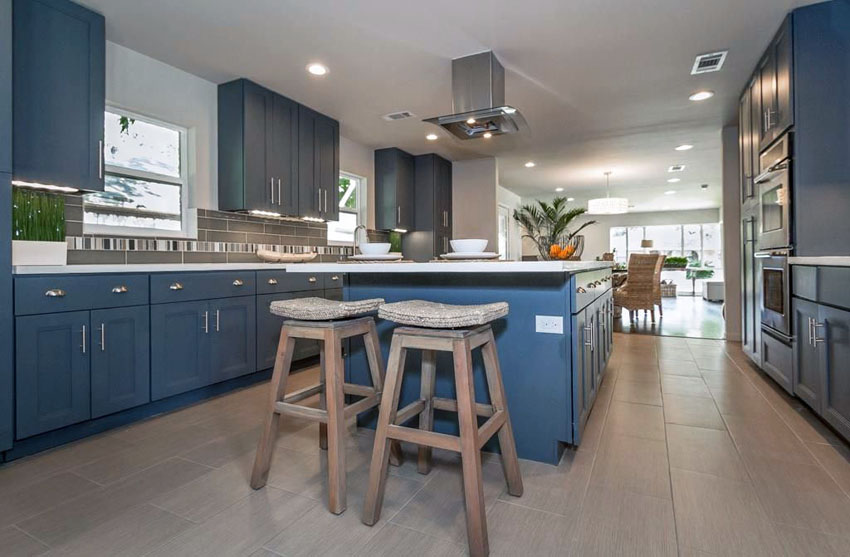 White Kitchen with Dark Blue Tiling photo - 3