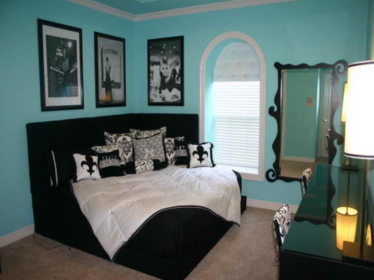 blue and white bedrooms with black furniture