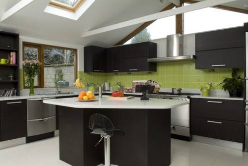 black kitchen cabinets and green walls photo - 1