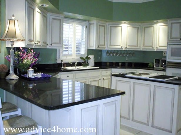 black kitchen cabinets and green walls photo - 6