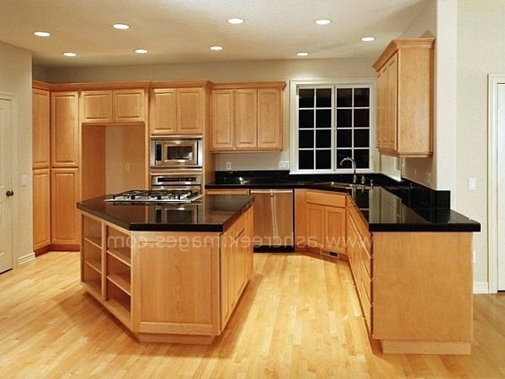 black kitchen cabinets with light countertops photo - 9