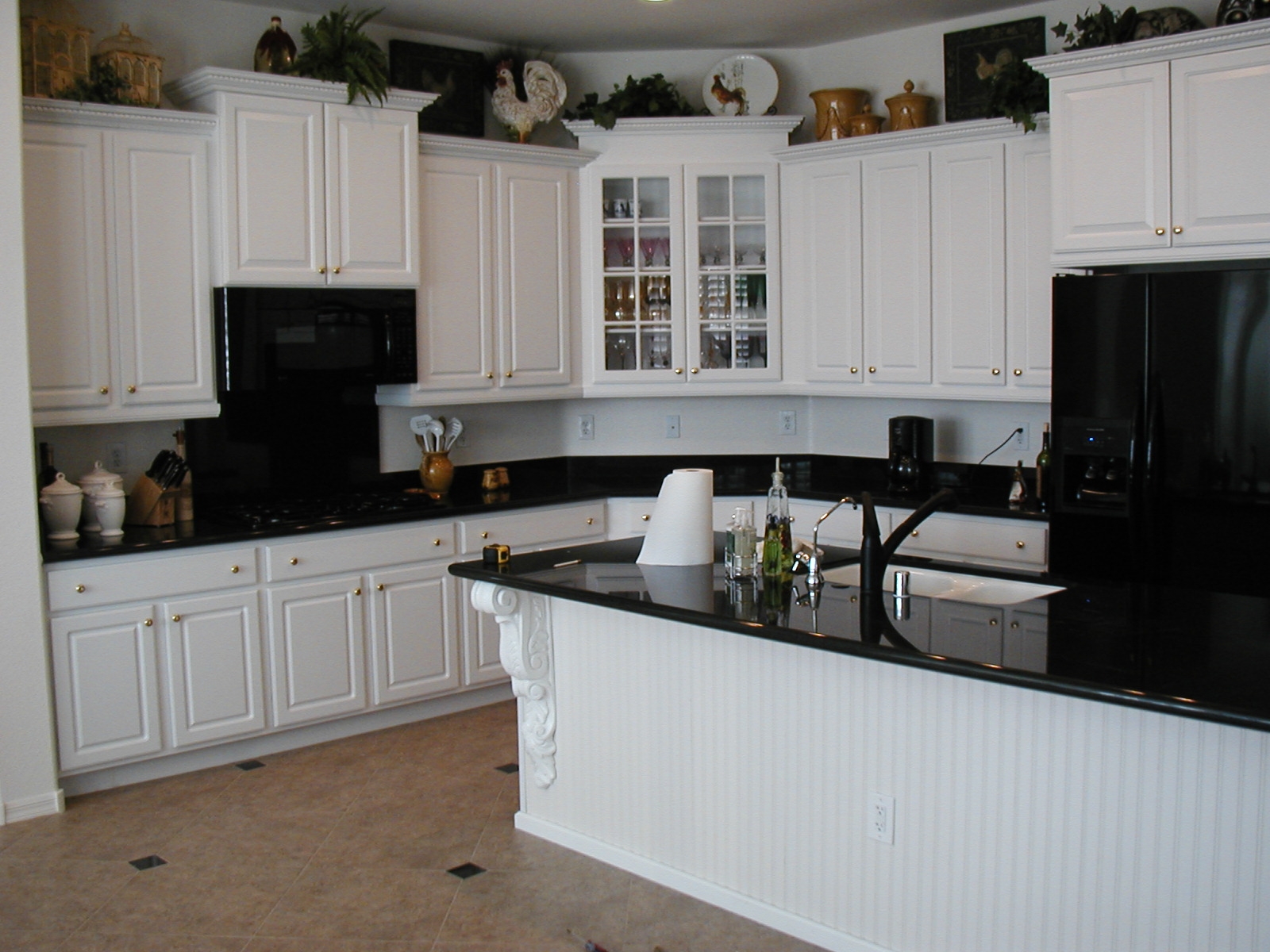 black kitchen cabinets with white appliances photo - 6
