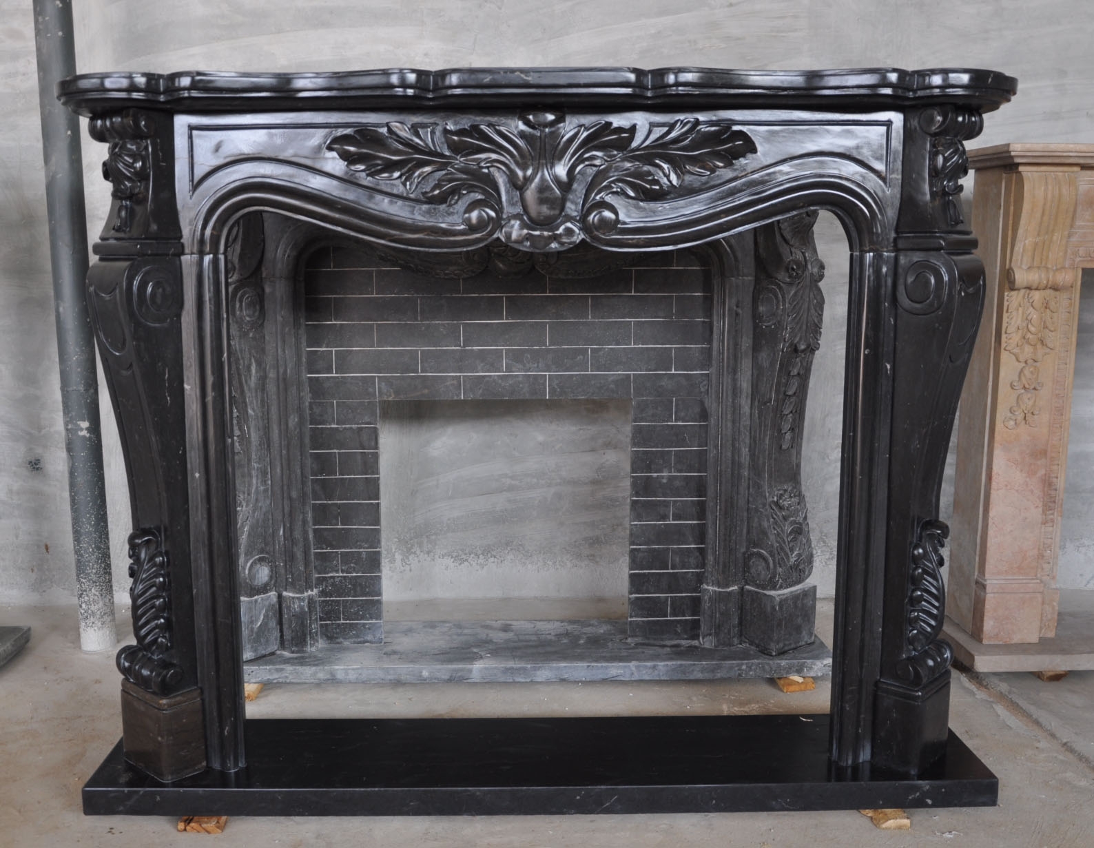 black marble fireplace surround photo - 5