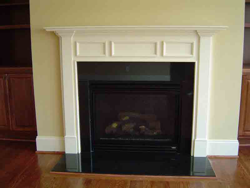 black marble fireplace surround photo - 6