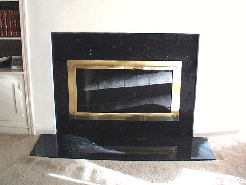black marble fireplace surround photo - 8