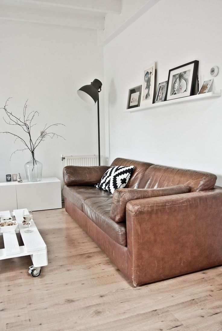 brown sofa black coffee table photo - 5