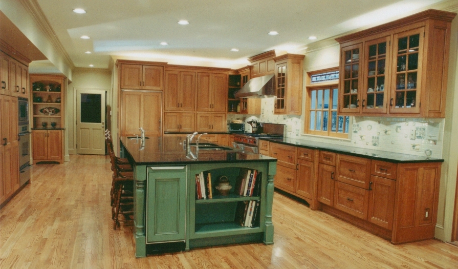 green stained kitchen cabinets photo - 3