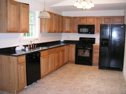 kitchen cabinet ideas with black appliances photo - 8
