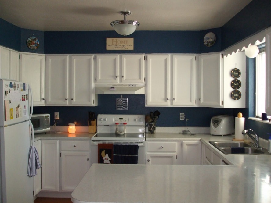 kitchen white cabinets blue walls photo - 10