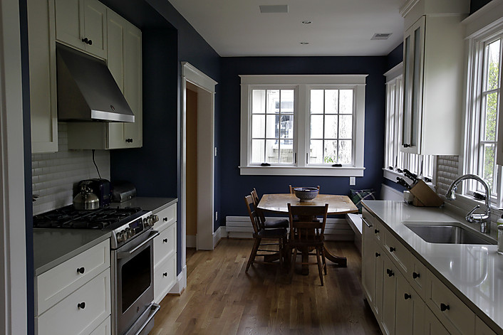 kitchen white cabinets blue walls photo - 8