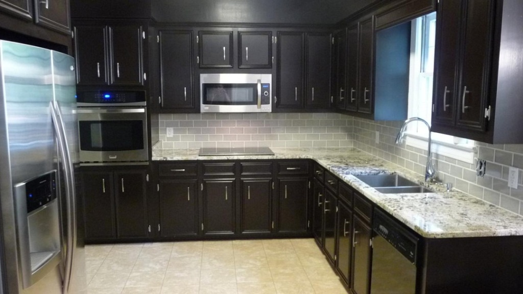 kitchen white cabinets dark backsplash photo - 9