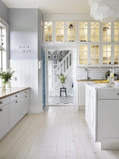 kitchen white cabinets tile floor photo - 8