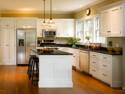 l shaped kitchen with white cabinets photo - 1