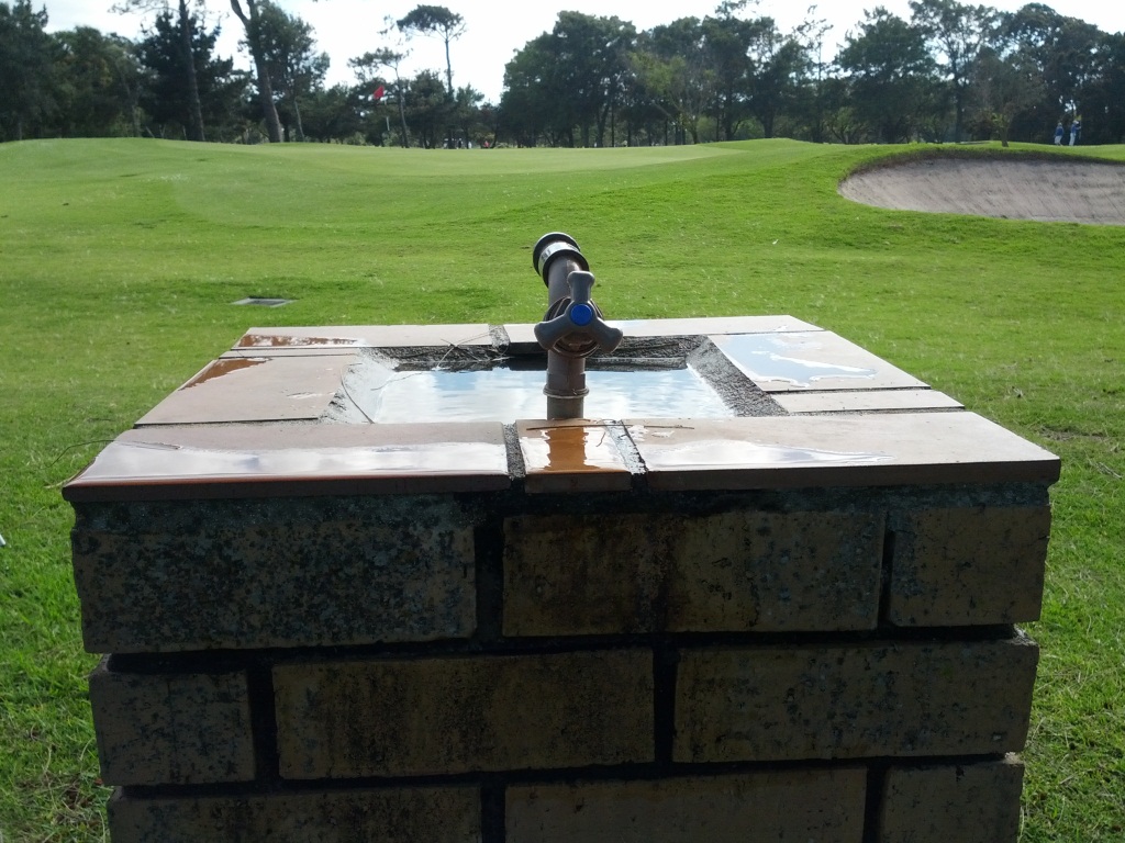 outdoor garden drinking fountain photo - 1