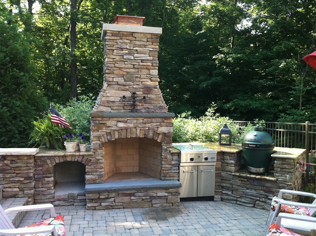outdoor kitchen and fireplace photo - 9