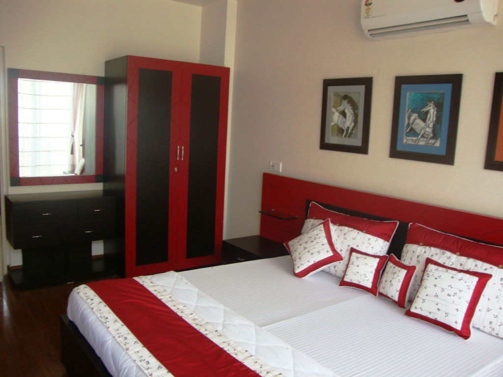 red bedroom black furniture photo - 4