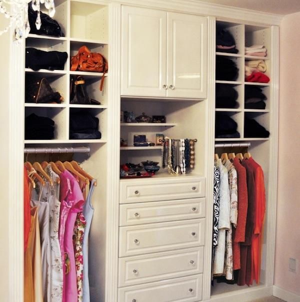 walk in closet in a small bedroom photo - 7
